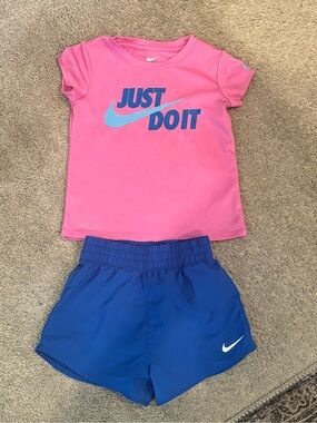 Nike Pink Tee with Blue 'Just Do It' Graphic and Royal Blue Shorts